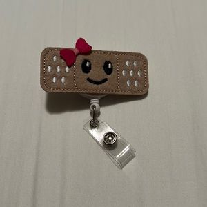 Bandaid Pink Bow Badge Reel (healthcare, nurse, CNA)